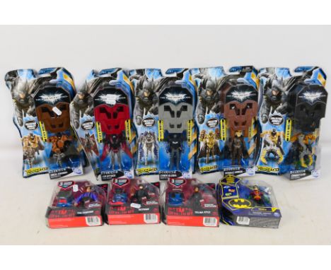 Mattel - Batman - Spin Master - A group of carded figures including, Batman, Robin, The Penguin, Selina Kyle, Combat Claw Bat