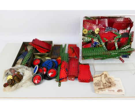 Meccano - A large quantity of vintage Meccano parts mainly in green and red. Lot includes a Meccano #192 Flexible Plate 5x11 