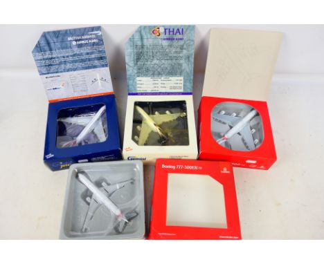 Gemini Jets - 4 x boxed aircraft in 1:400 scale, a 777-300ER in Emirates livery, an A380-800 in Emirates livery, an A380 in T