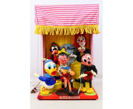 Pelham Puppets - An unboxed electric puppet theatre display (approximately 35cm x 24cm x 52cm approximately) containing 5 mar