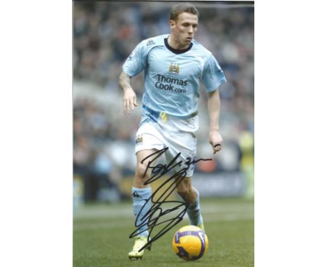 Football Craig Bellamy 12x8 signed colour photo pictured playing for Manchester City. Good Condition. All signed pieces come 