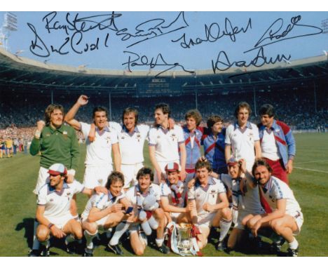 Football Autographed WEST HAM UNITED photo, a superb image depicting the 1980 FA Cup winners posing with their trophy during 