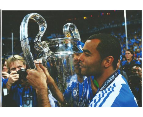 Football Ashley Cole 8x12 signed colour photo pictured with the Champions League trophy while playing for Chelsea. Good Condi