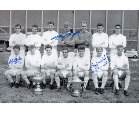 Football Autographed LEEDS UNITED photo, a superb image depicting the 1964 Second Division winners posing with their trophy d