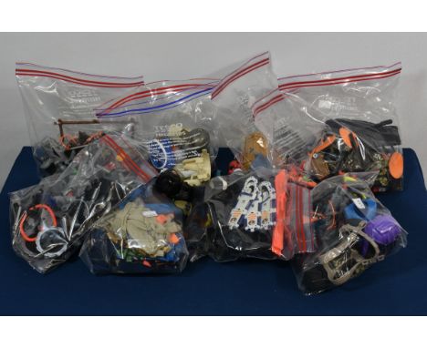 A large collection of various Action Man accessories to include clothes, helmets, weapons etc (large quantity)