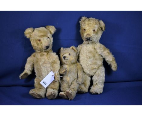 Three c1930's Teddy Bears Hermann baby bear with bells in tummy, pair of Chiltern bears, 18in. (45.8cm.) tall. (3) 