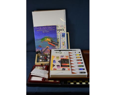 A Daler-Rowney cased oil painitng set with two art books and two blank canvas. Plus a cased chess/backgammon/draughts set and