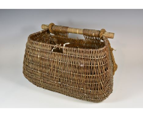 A large antique/vintage wicker paneco fishing basket (17in.) 