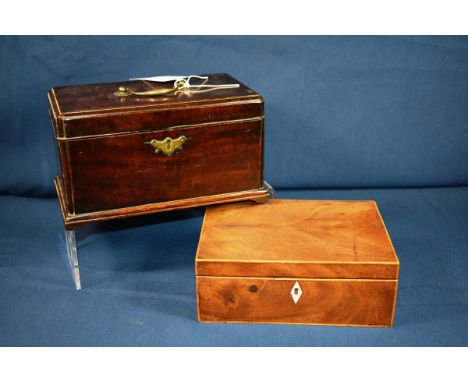 A George III mahogany tea caddy sarcophagus form with brass handle, later twin compartment interior and short bracket feet, 1