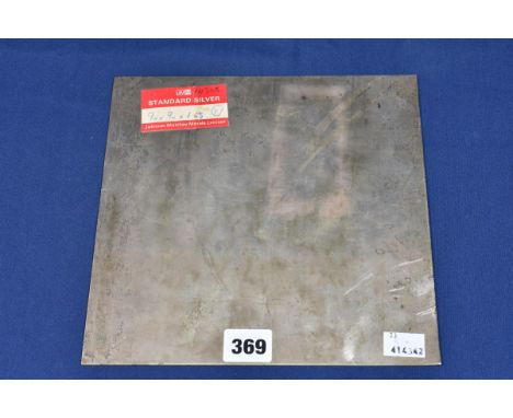 A square sheet of sterling silver, 9 x 9in., 1/16th inch thick, by Johnson Matthey Metals Ltd. 