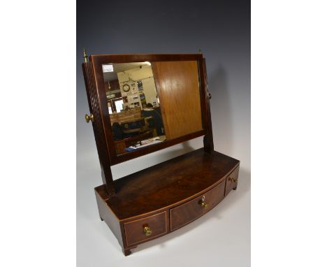 A George III inlaid mahogany box base bowfront toilet mirror the rectangular, boxwood strung mirror on tapered reeded upright