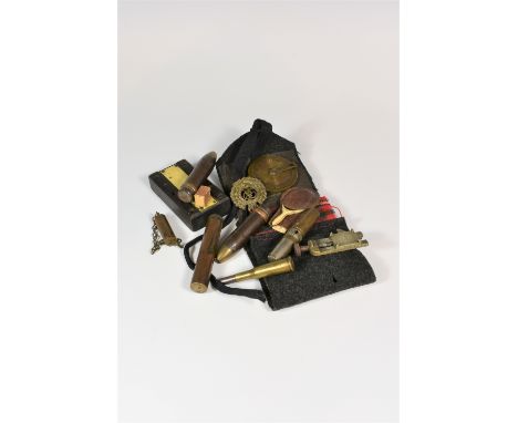 A rummage tray of WWI / Boer War collectables etcthe collection comprising of Lee Enfield bore viewer; Enfield brass oil bott
