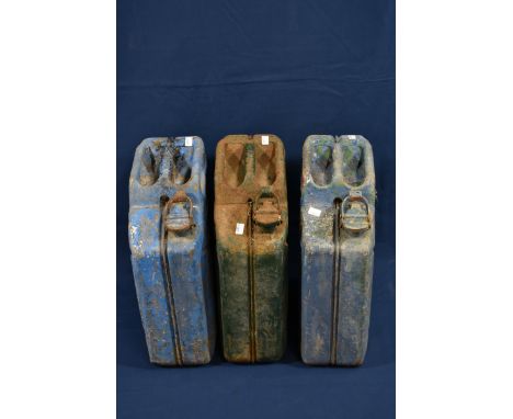 Three vintage petrol cans.   