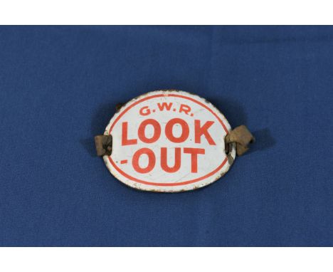 Railwayana - GWR Great Western Railway enamel "LOOK OUT" armband of oval, curved shape, G.W.R. LOOK-OUT, red lettering, on wh
