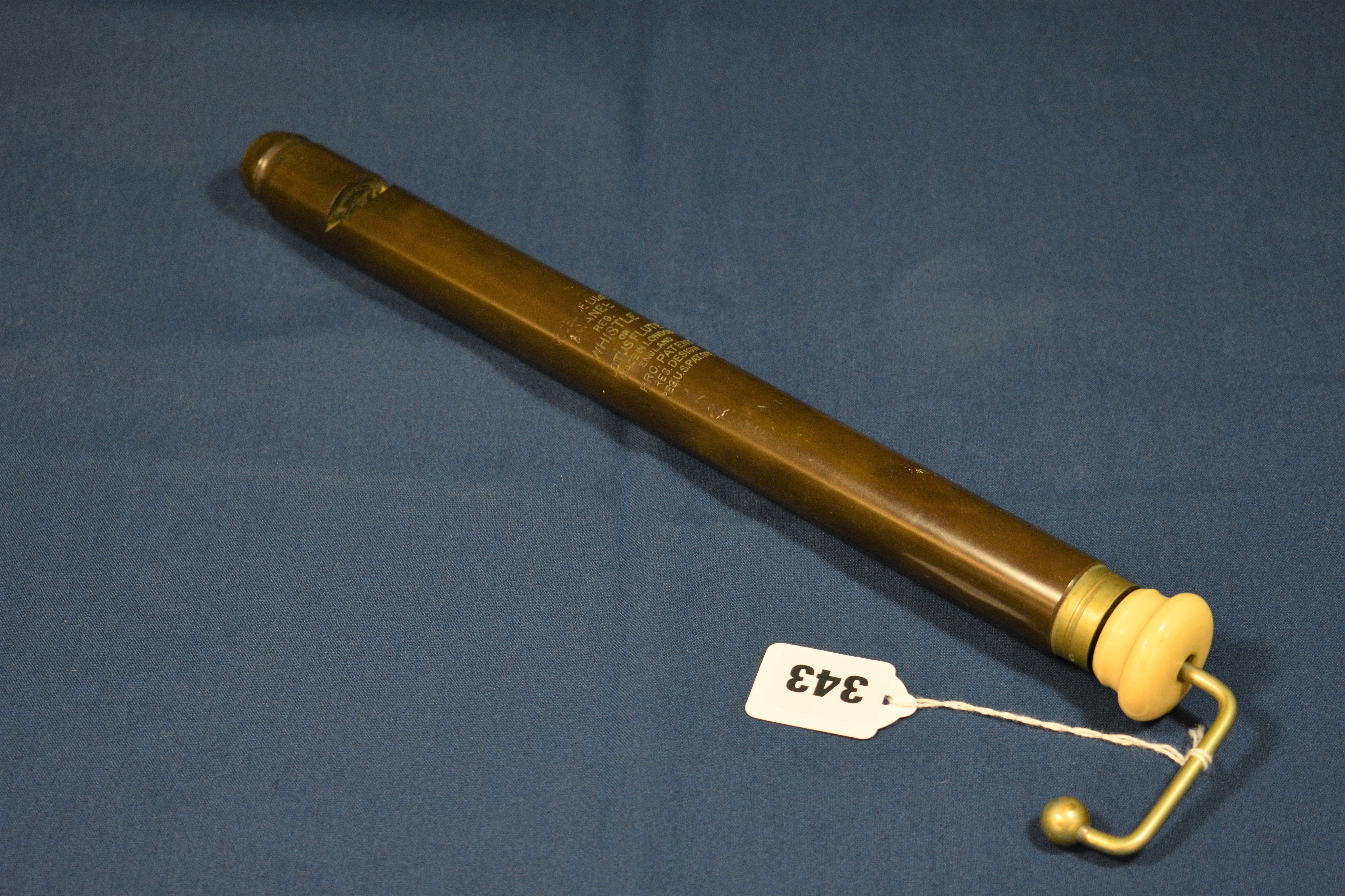 An ebonite Model de Luxe Swanee whistle or Lotus flute 13óin. (35cm.) long.