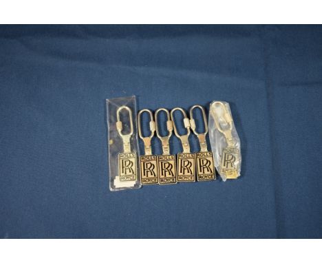 Six sterling silver and enamel Rolls-Royce keyrings 