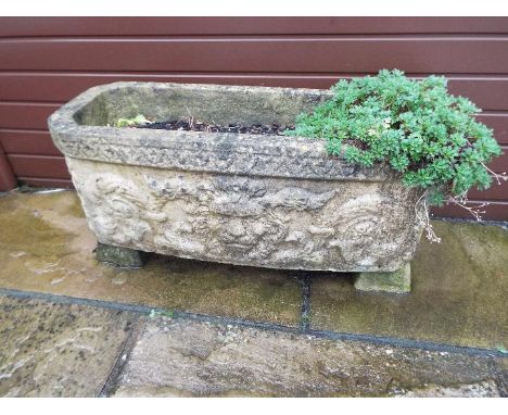 A reconstituted stone rectangular planter, 27 cm x 71 cm x 33 cm  NOTE: ITEM IS LOCATED IN ST HELENS, THE SUCCESSFUL BIDDER W