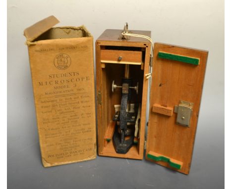 A student's microscope, model 3, by Signalling Equipment Ltd, mahogany case, original cardboard box