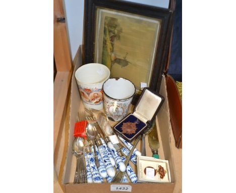 A ceramic hafted onion pattern fish set; a Borough of Derby 1897 tin glaze beaker; a Red Cross badge; an oak framed silk prin
