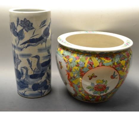 A Chinese fish bowl; a blue and white stick stand (2)