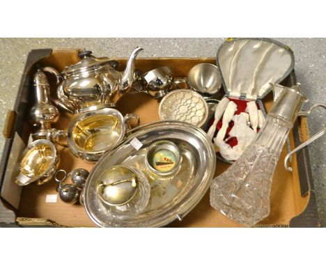 Metalware - a Mappin and Webb cruet, a silver plated collared claret jug; a three-piece plated tea set; a plated sugar caster