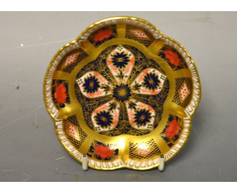 A Royal Crown Derby 1128 pattern shaped circular trinket dish, solid band, printed mark, first quality