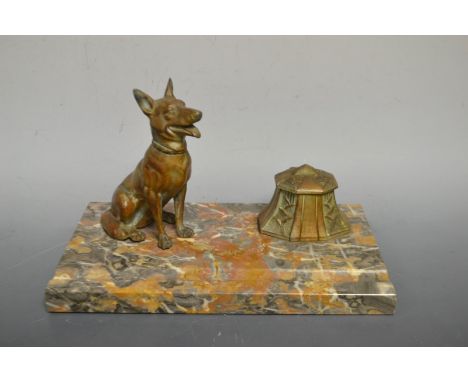 An Art Deco spelter and marble desk stand, elongated octagonal Inkwell, Seated Alsatian model, pen tray, rectangular base