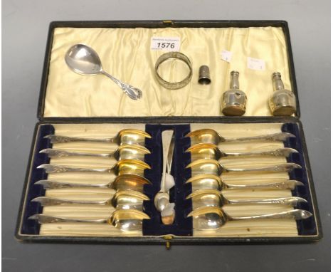 A Silver caddy spoon, Joseph Gloster Birmingham 1897; a silver  thimble; a set of twelve EPNS tea spoons and sugar tongs, cas