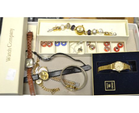 Watches - a lady's Tewar 9ct gold case bracelet watch, silvered dial, baton markers, manual movement, fancy link 9ct gold str