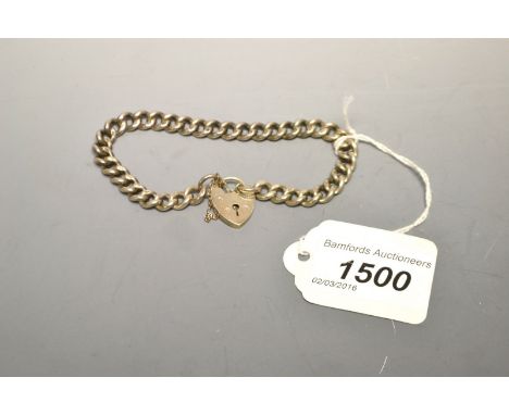 A silver curb link bracelet, love heart clasp, 24g