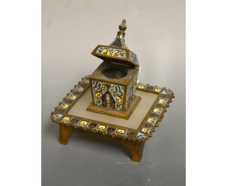A brass and enamel champleve shaped square inkwell, hinged cover, early 20th century