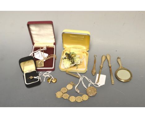 Jewellery - a silver envelope stamp case pendant on chain; a Crown Derby floral brooch; an Aesthetic movement silver brooch; 