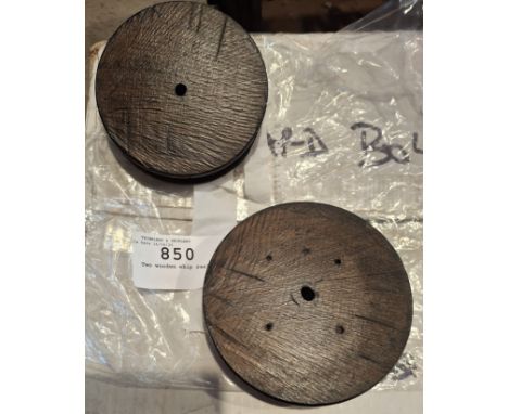 Two wooden whip reels