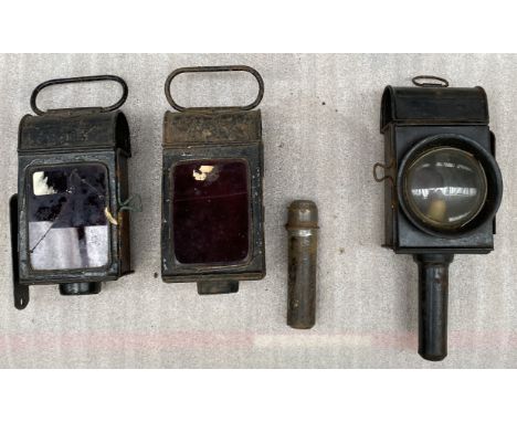Two black painted rear lamps and a lantern