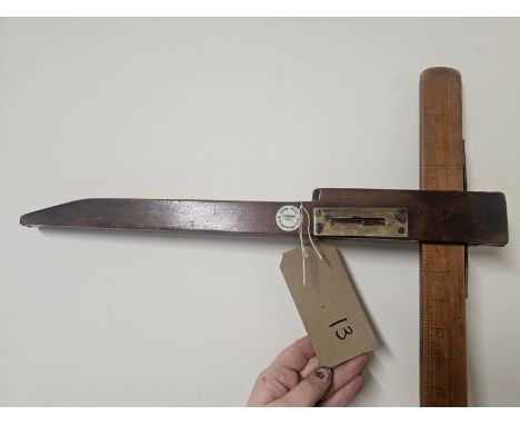 Antique measuring stick by Tom Hill of Knightsbridge, London
