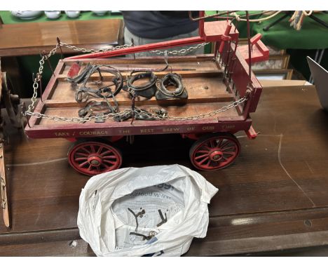 A model of a Courage Brewery Dray. Signwritten: “Take Courage – The Best Brew of Our Time.” “London Alton” marked to the fron