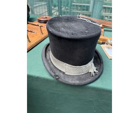 Black silk top hat by Patey
