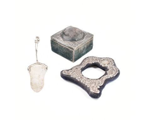 A group of antique and vintage silver hallmarked items. The lot to include an Edwardian sewing pin box with pincushion to lid
