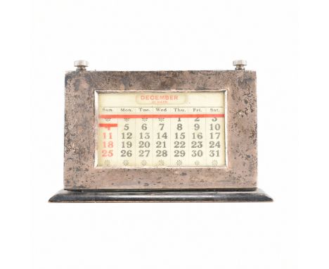 A 1926 art deco hallmarked silver and wood desk calendar. The calendar having two manually rotating dials to the top to set t