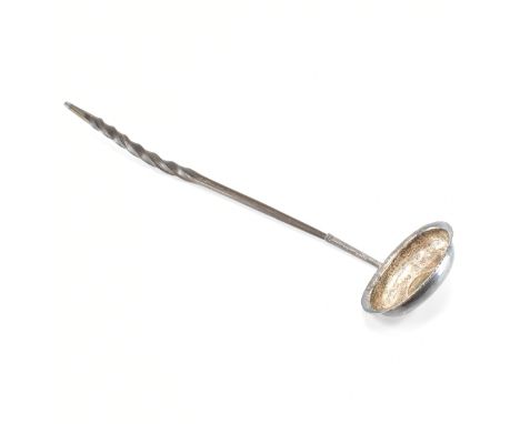 A George III white metal mounted whalebone toddy ladle spoon. The ladle having inset William III shilling 1669 to the bowl ha