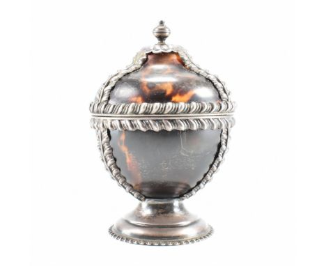 A 19th Century Victorian tortoiseshell and silver lidded pot. The pot having fluted detailing to the body and a rounded base.