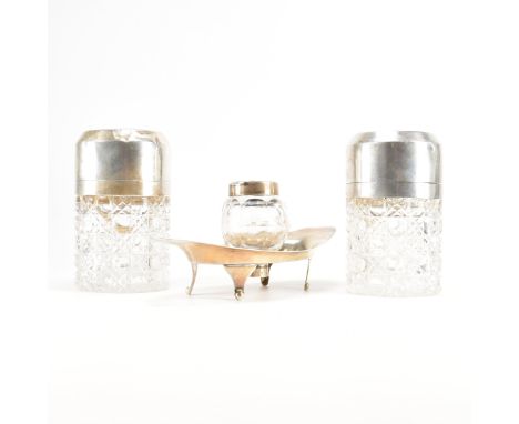 An Edwardian silver hallmarked and glass inkwell, together with two Victorian glass bottles. The inkwell having a detachable 