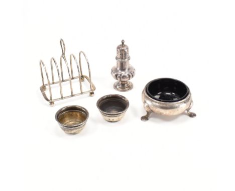 A selection of antique silver hallmarked items. The lot to include a toast rack (hallmarked Birmingham,&nbsp;J Sherwood &amp;