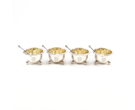 A set of four 19th Century Victorian silver hallmarked table salts. Each salt having a flared rim and gilt interior raised on
