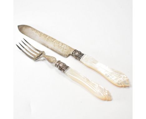 A 19th Century Victorian silver and mother of pearl serving set. The lot to include a knife and fork with mother of pearl han