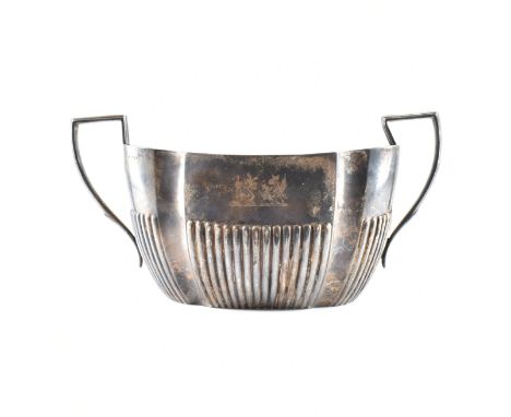 A 19th Century Victorian silver hallmarked twin handled sugar pot. The sugar bowl having a gadrooned detailing to the to the 