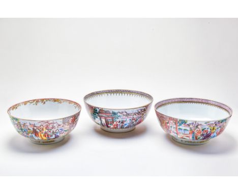 Qianlong period (AD 1735-1796), Qing dynasty.A set of three Chinese mandarin punch bowls. The body is decorated with panel pa