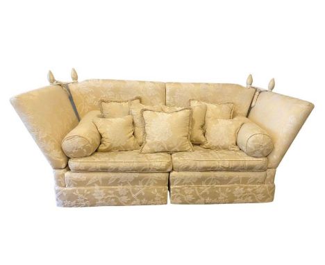 A modern Knole sofa, circa 2014, of typical form, with hinged side arms, a high back, with assorted matching seat cushions, c