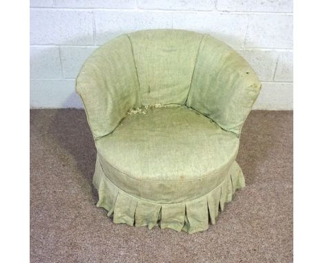 A Victorian tub armchair, late 19th century, currently upholstered in light green