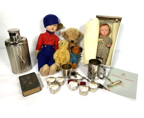 A group of miscellaneous items, including a large vintage teddy bear, assorted dolls, a cased set of modern flatware, two sug